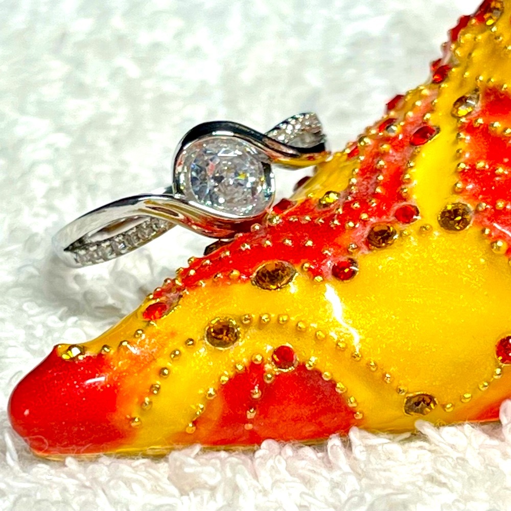 Elegant Silver Swirl Diamond Ring